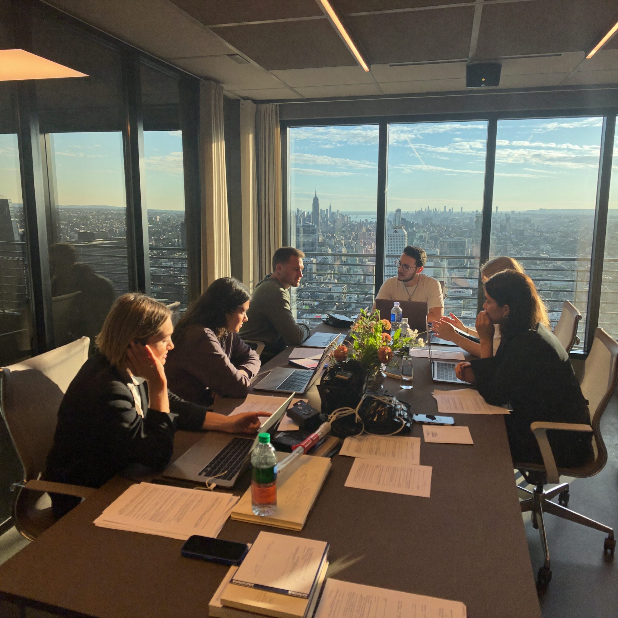 Boardroom quarterly planning session for a capital raise